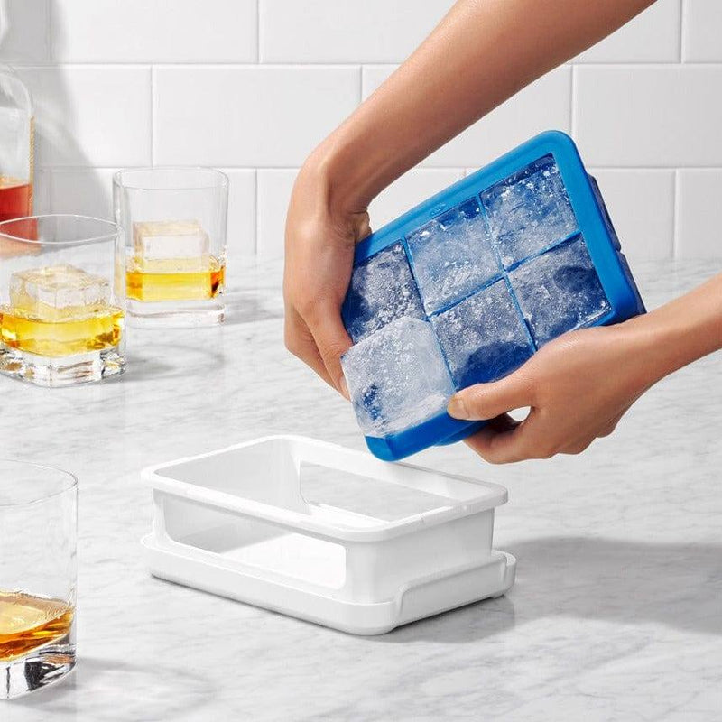 https://www.modernquests.com/cdn/shop/files/oxo-good-grips-ice-cube-tray-with-lid-large-cubes-1_800x.jpg?v=1690056114