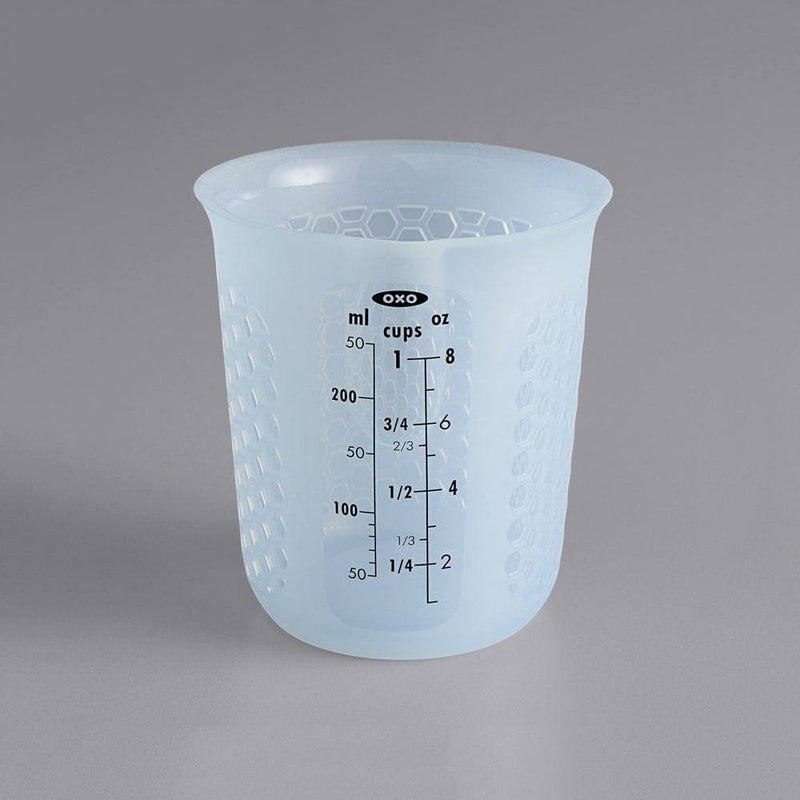 https://www.modernquests.com/cdn/shop/files/oxo-good-grips-squeeze-and-pour-silicone-measuring-cup-250ml-3_800x.jpg?v=1690059775