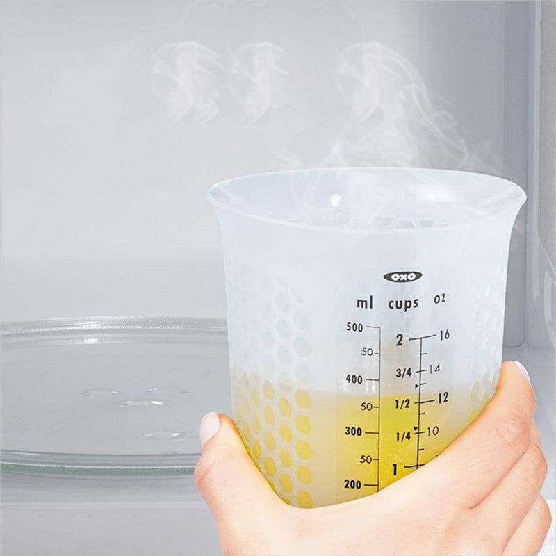 https://www.modernquests.com/cdn/shop/files/oxo-good-grips-squeeze-and-pour-silicone-measuring-cup-500ml-8_800x.jpg?v=1690059790