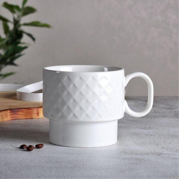 https://www.modernquests.com/cdn/shop/files/sagaform-sweden-coffee-and-more-tea-mug-white-1_600x.jpg?v=1690041487